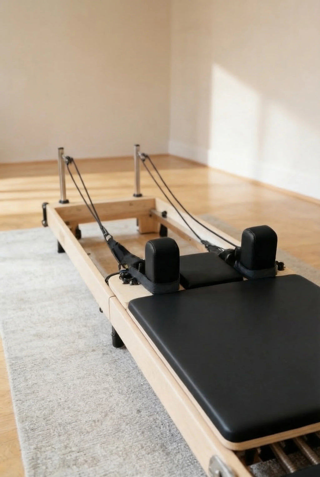 Moko foldable Pilates reformer set up in a home workout space