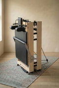 Moko foldable Pilates reformer in use at home