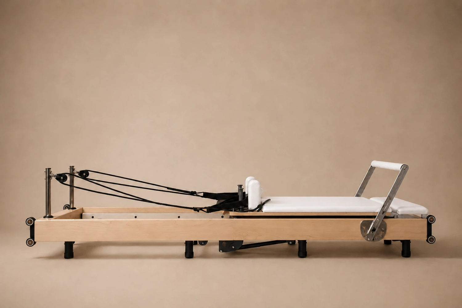 white foldable pilates reformer
