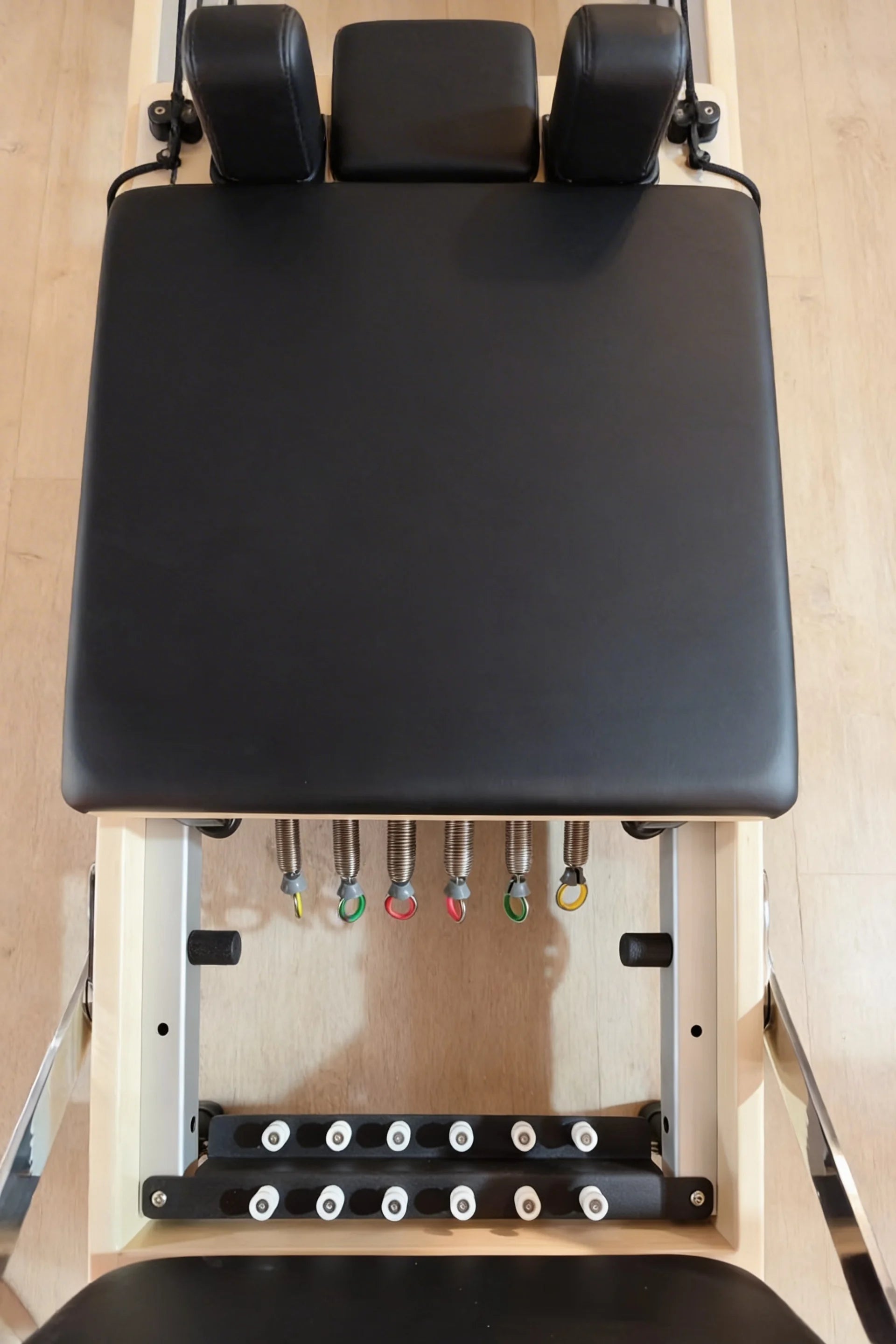Moko Pilates reformer in a bright living room ready for use