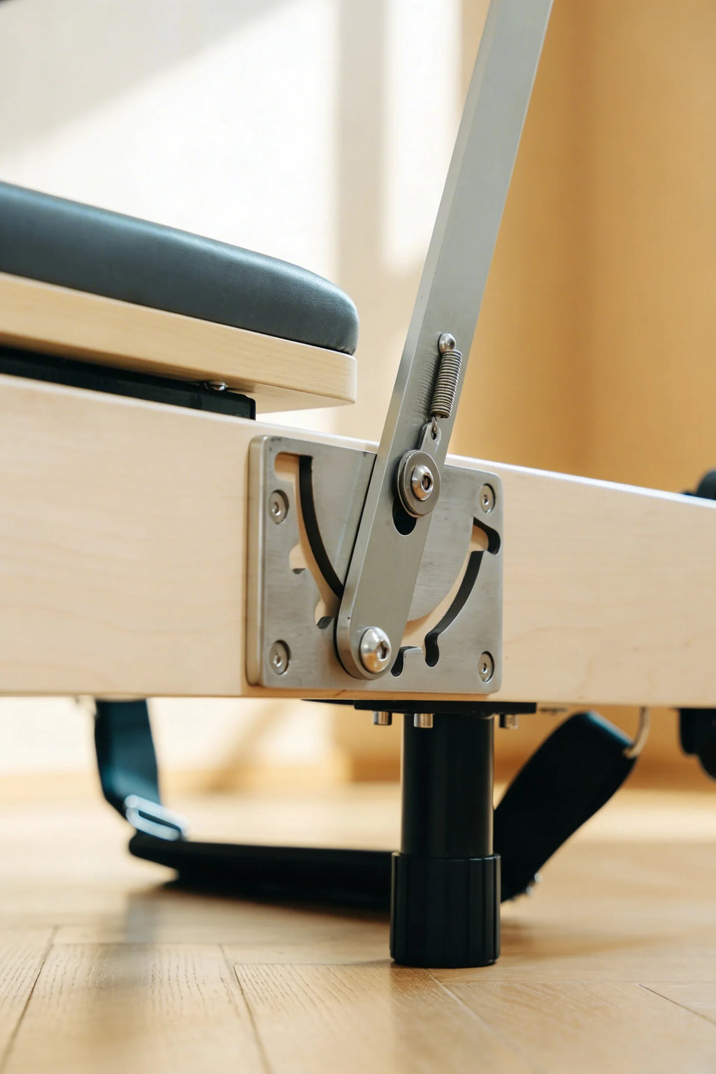 Moko Pilates reformer unfolded in a living room home studio