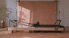 Foldable pilates reformer in a living room