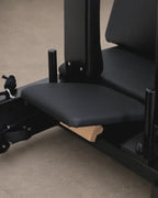 Primer plano del reposacabezas ajustable de un Reformer de Pilates telescópico